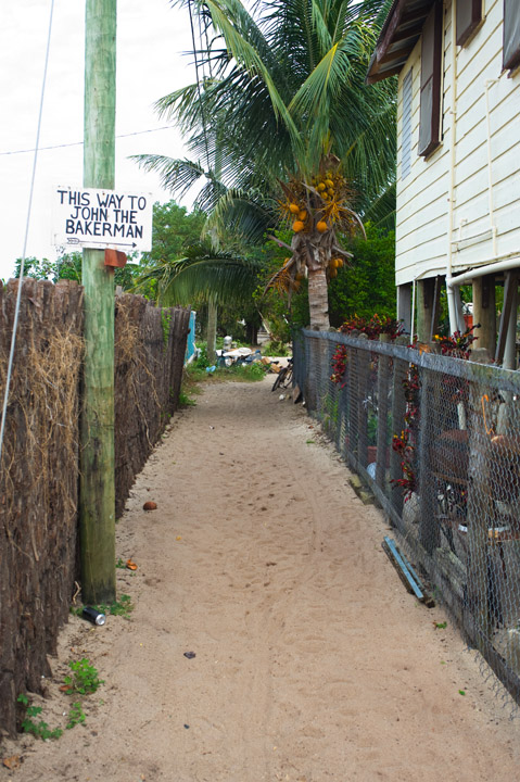 JohnTheBakerman.jpg - Placencia alleyway.