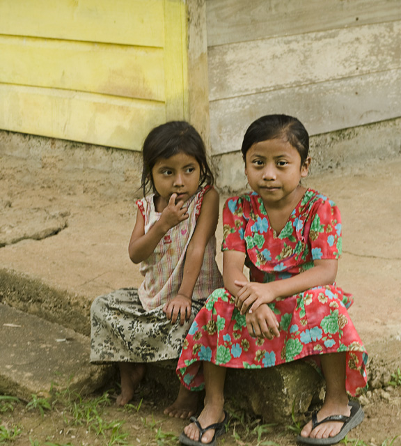 Laguna2Girls_2537.jpg - Two young girls sit outside the community center in Laguna.